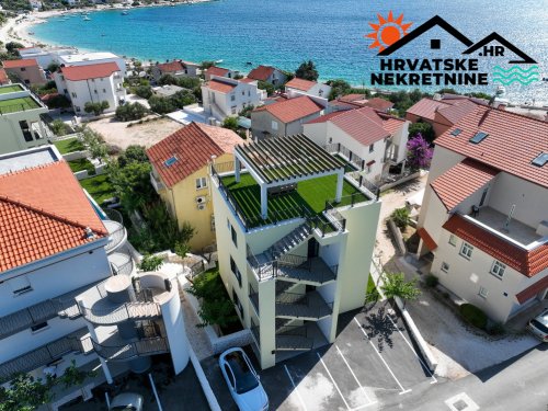 Apartmani s bazenom uz more